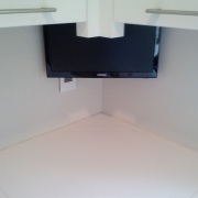 TV lowering over counter cabinet 